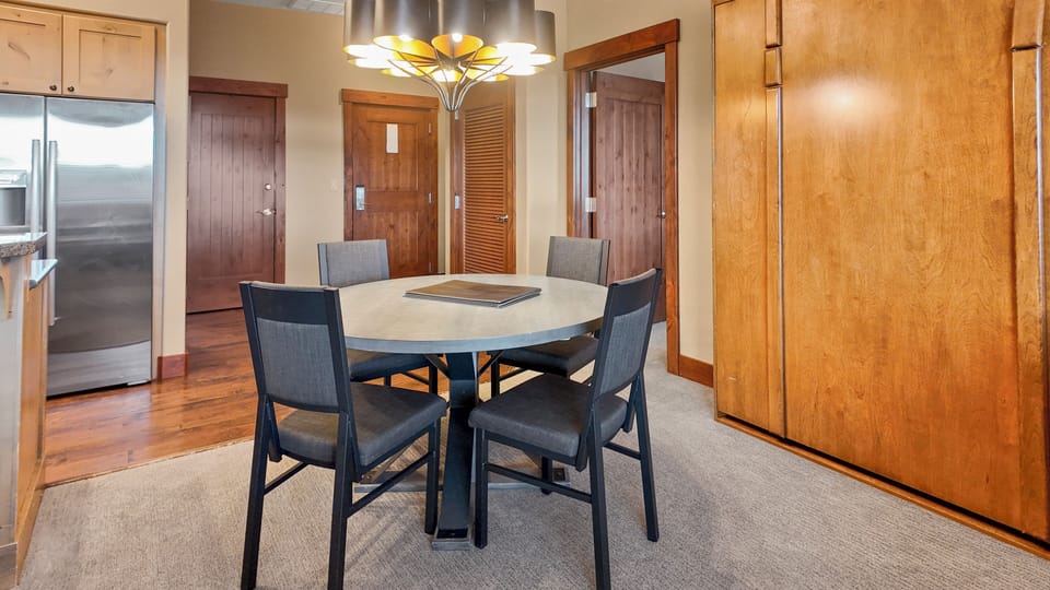 Bright dining space beside the kitchen, perfect for shared meals.