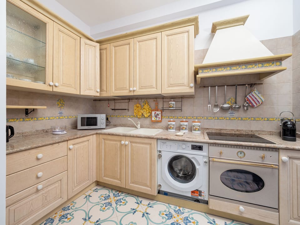 Panoramic Apartment, Balcony, Sea View | Private kitchen | Fridge, microwave, oven, stovetop