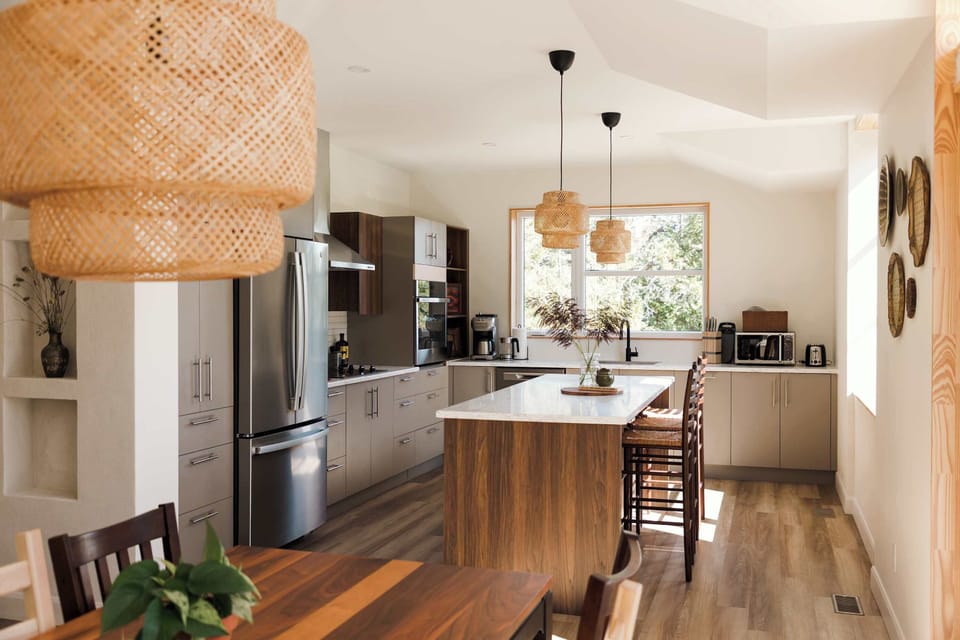 Sun-drenched kitchen, dining + living room - all open floor concept