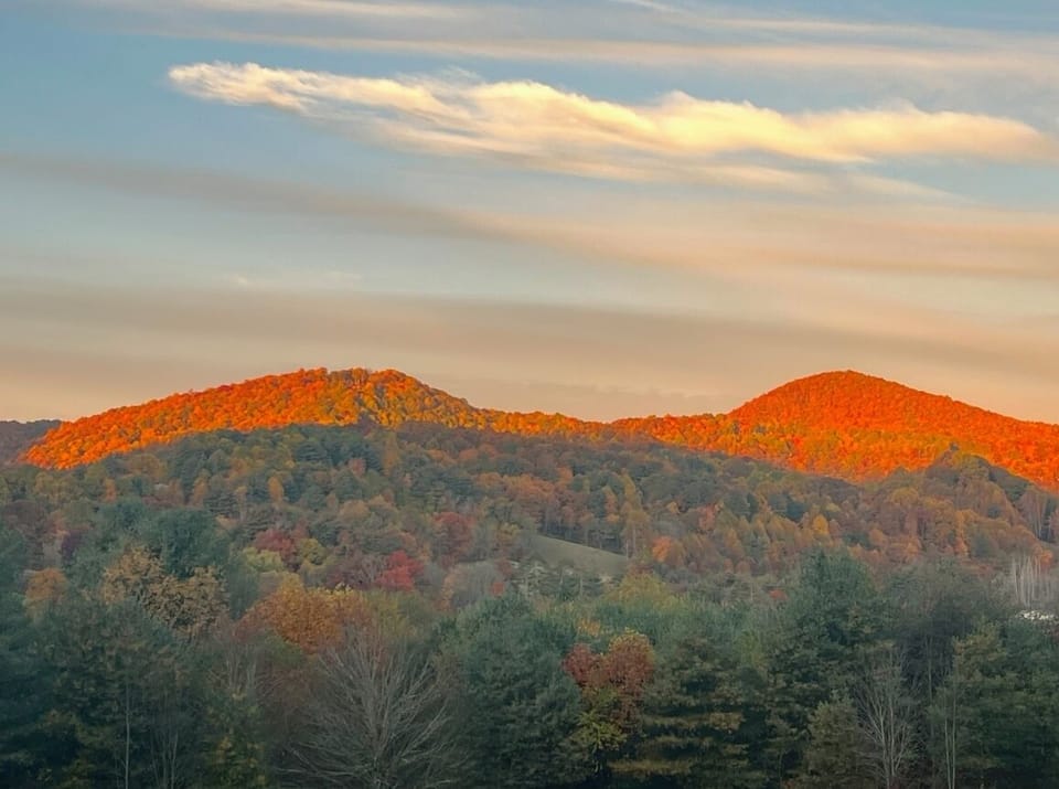 Sweeping orange mountain views from your boutique tiny house decks