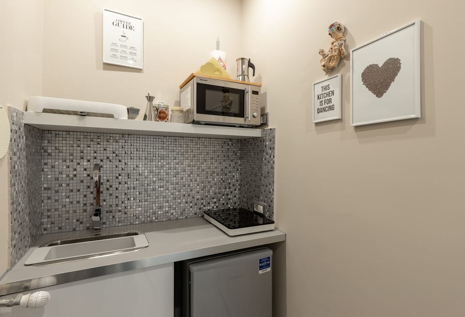 Apartment, 2 Bedrooms, Balcony | Private kitchen | Coffee/tea maker, dining tables