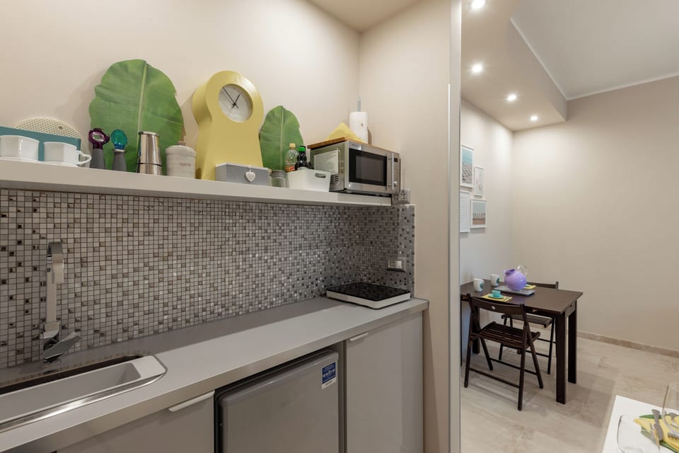 Apartment, 2 Bedrooms, Balcony | Private kitchen | Coffee/tea maker, dining tables