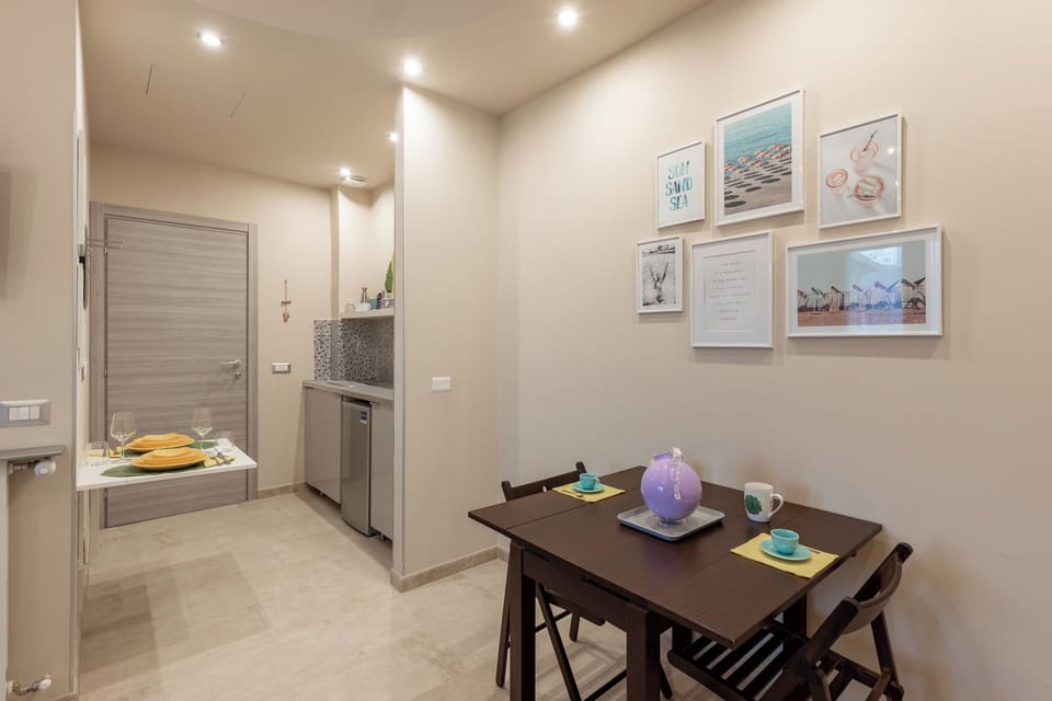 Apartment, 2 Bedrooms, Balcony | Private kitchen | Coffee/tea maker, dining tables