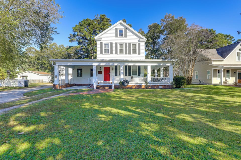 Property Exterior | Covered Porch w/ Seating | Spacious Yard