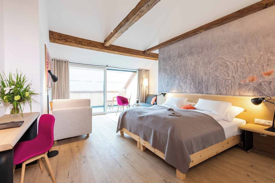 Junior Suite, Courtyard View | In-room safe, blackout drapes, free WiFi
