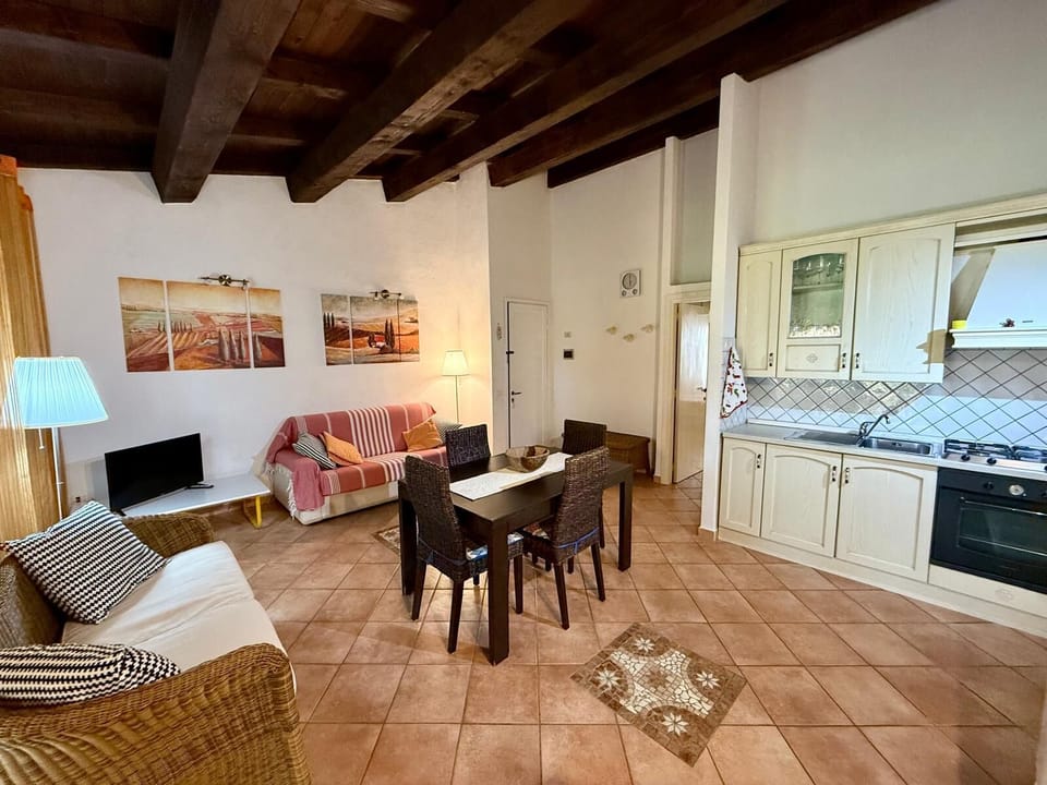 Apartment | Living area | 22-inch flat-screen TV with cable channels