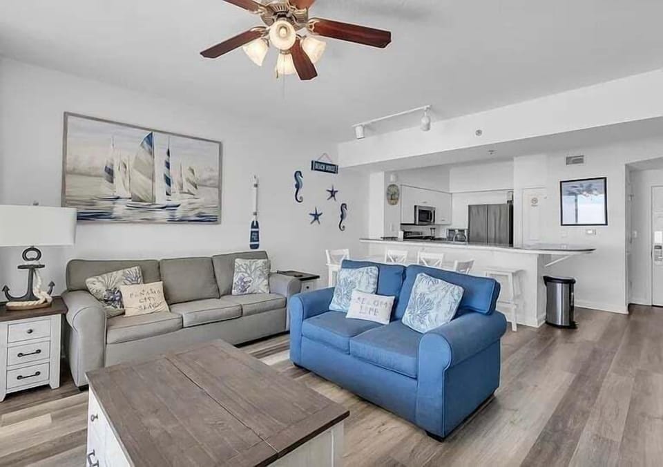 Open concept living area with stylish furnishings