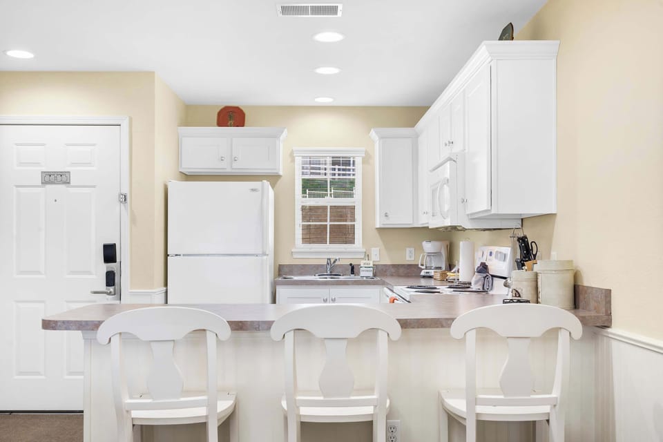The open, airy kitchen is well equipped for an unforgettable getaway​