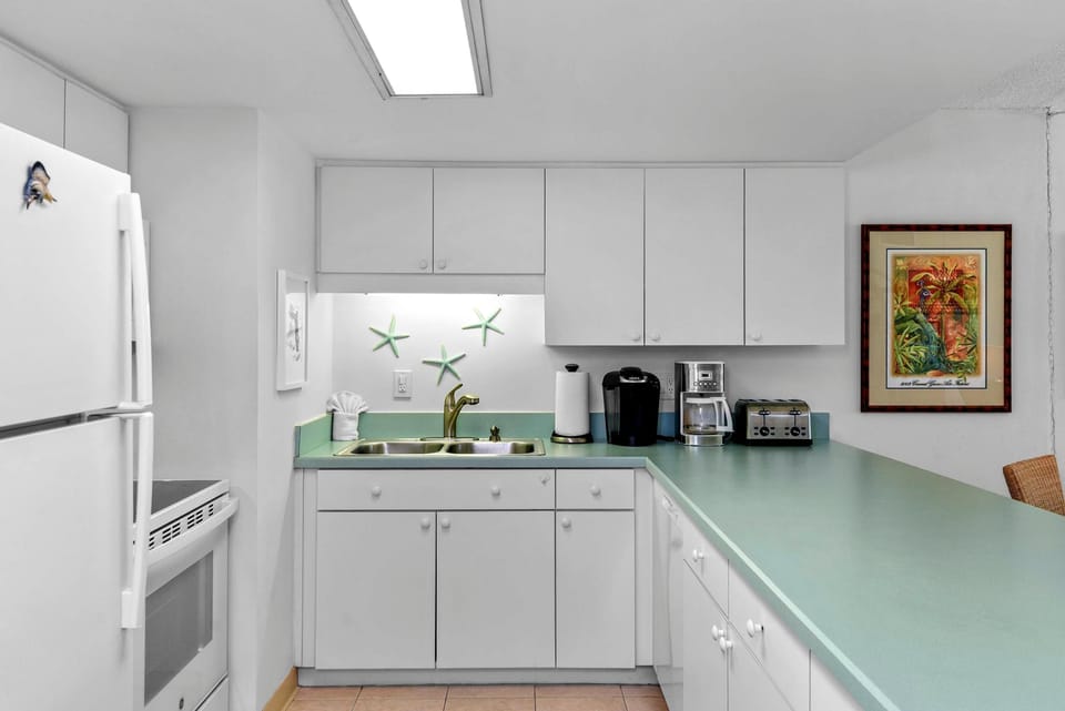 Condo, Multiple Beds (Seaward B101) | Private kitchen | Oven, toaster