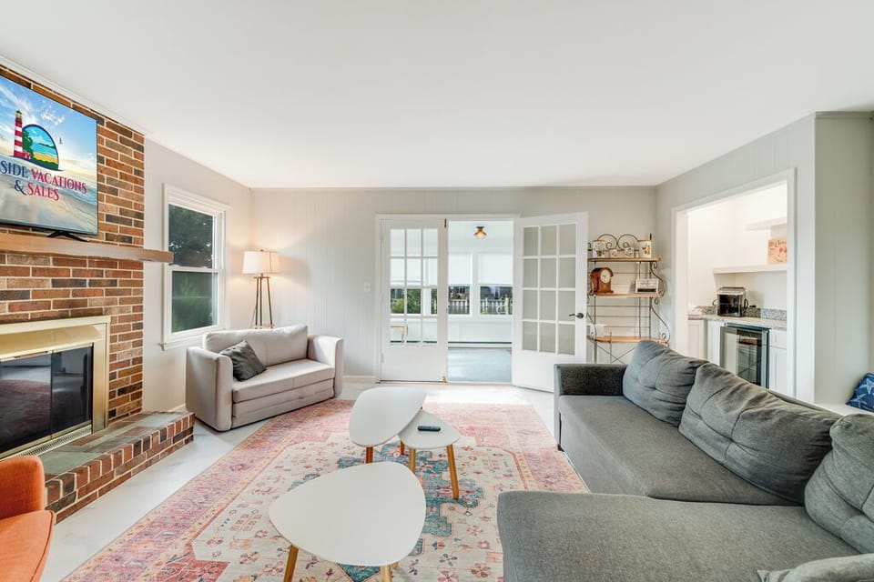 Slip out the French Doors to the Waterfront Sunroom with amazing Views!