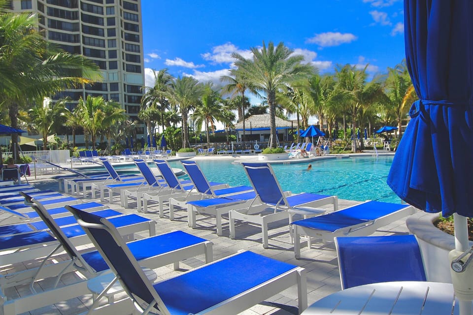 Lounge Chairs await at the gorgeous new Main Resort Pool, with On-site Tiki Bar.