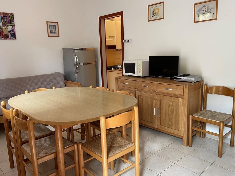 Apartment, 3 Bedrooms, Patio | Dining room