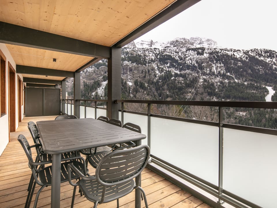 Gather for al fresco meals on the spacious terrace, surrounded by alpine charm.