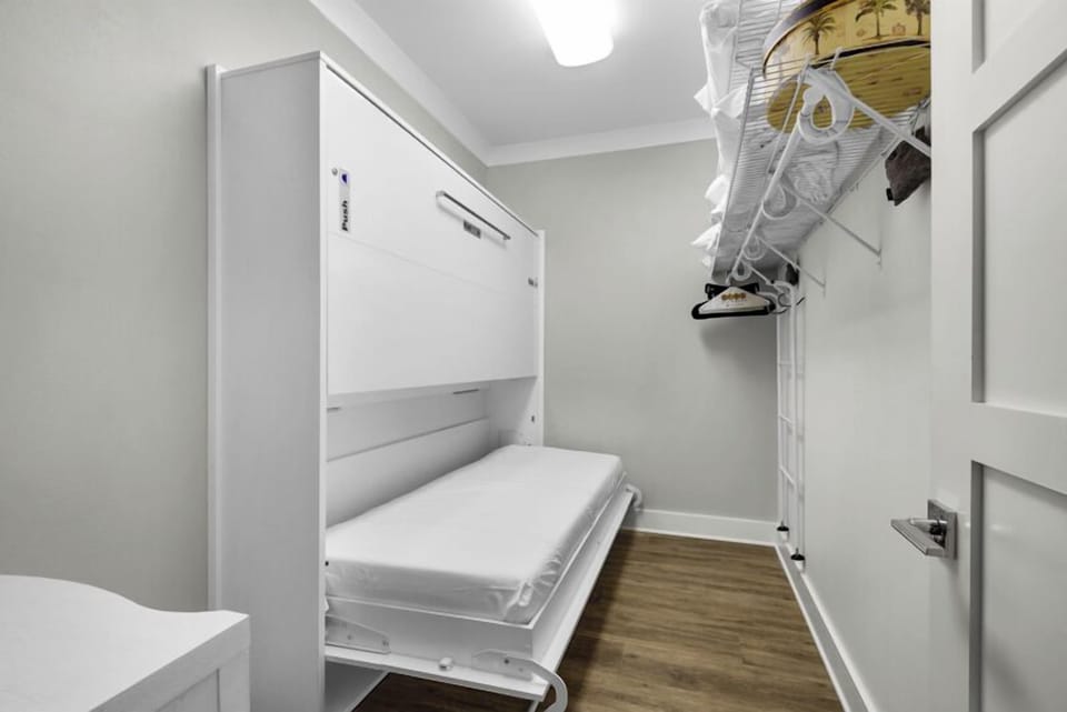 Murphy twin over twin bunks in the primary bedroom walk-in closet