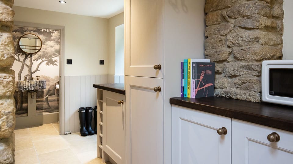 Just around the corner from the kitchen is a utility area.