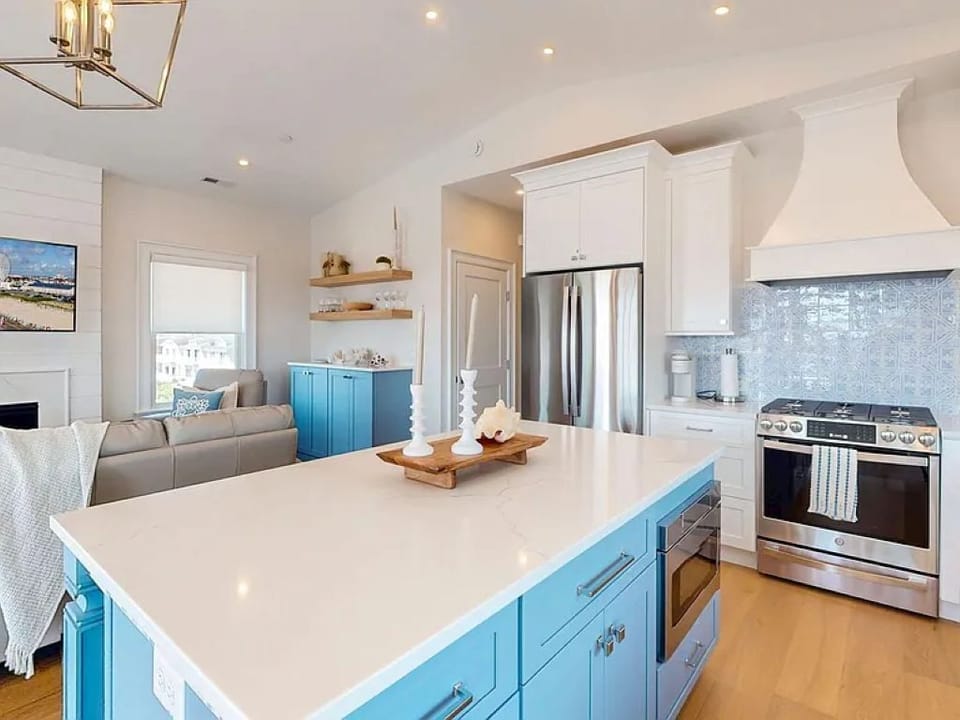 Sleek kitchen island with coastal theme
