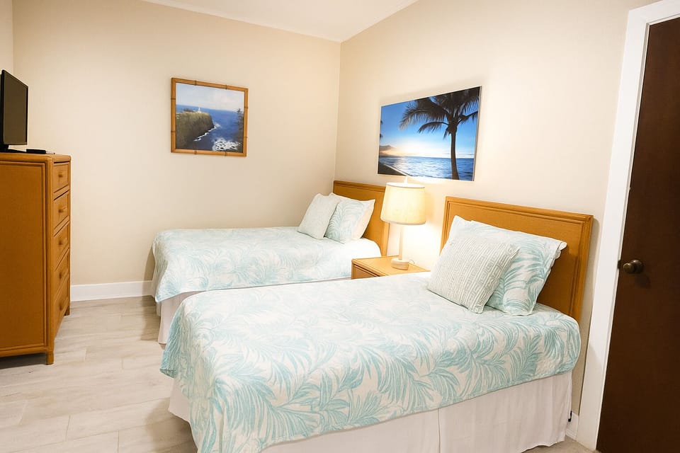 Bedroom with two twin beds - can be converted to king bed upon request