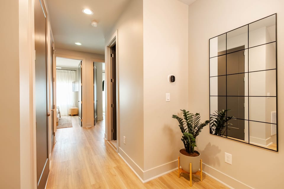 Upstairs hallway connecting bedrooms and living spaces