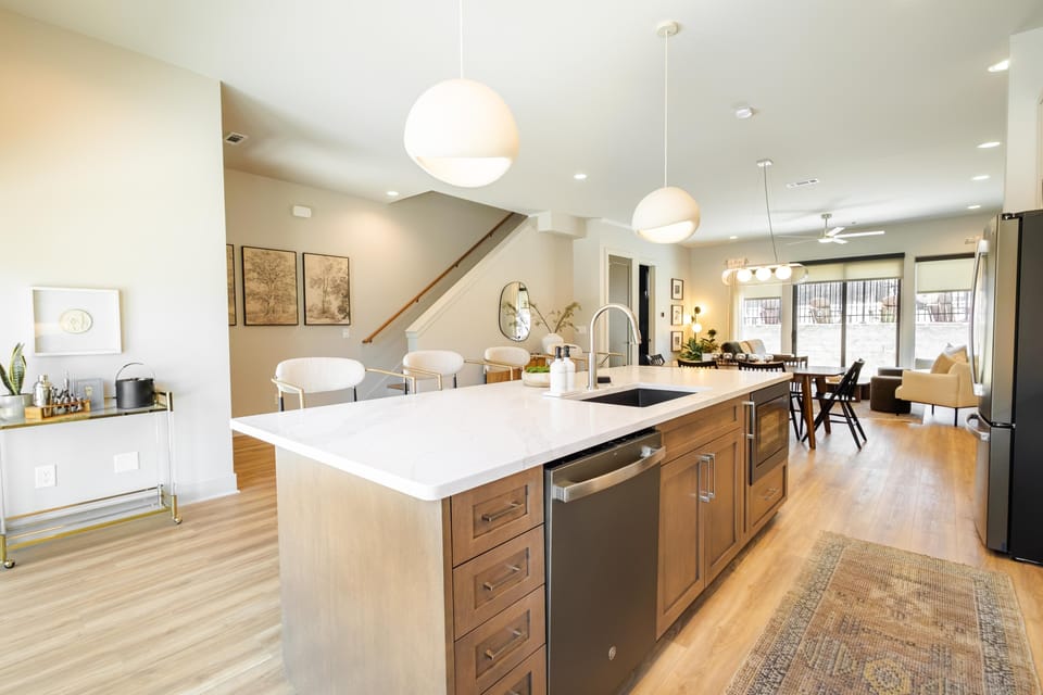 Fully stocked modern kitchen with large island — perfect for group meals and hosting