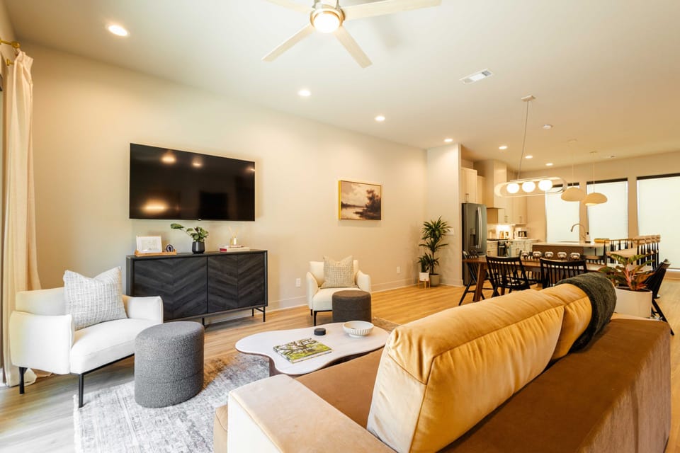 Living room with designer finishes and pull-out queen sofa bed
