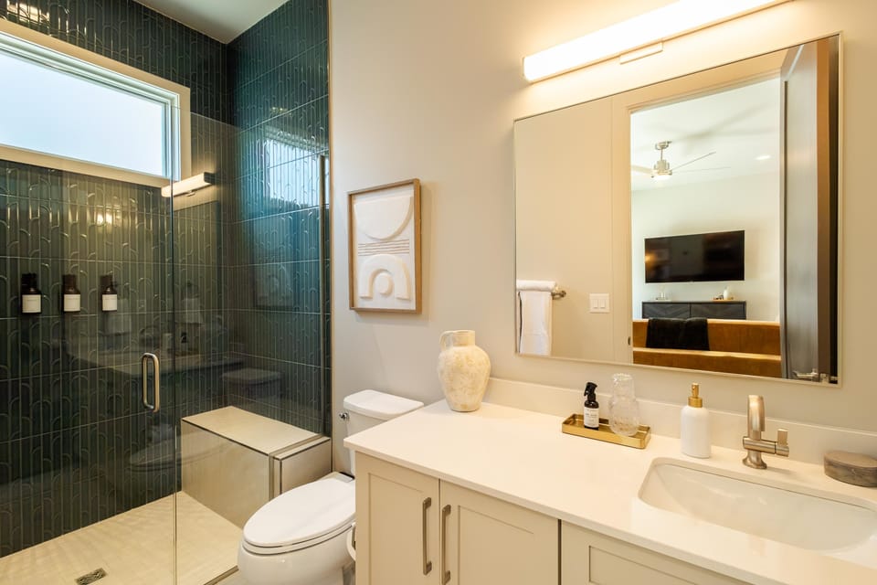 Bathroom 1 (downstairs)- bathroom with luxury shampoo, conditioner, and body wash for a comfortable stay