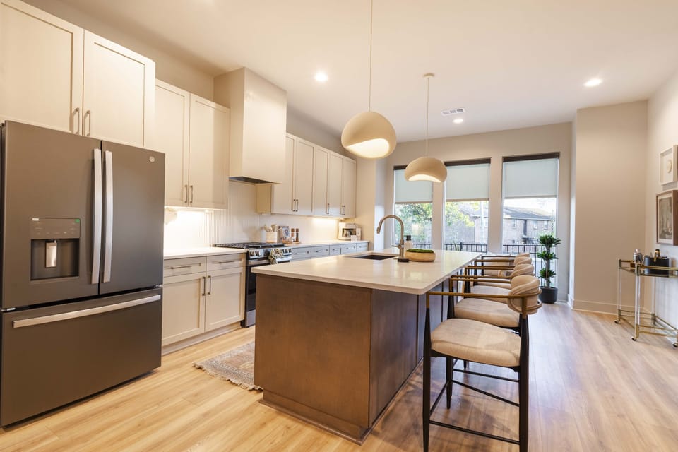 Light- filled, modern kitchen perfect for entertaining and gathering