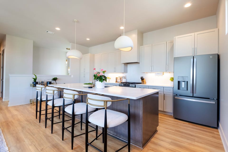 Gourmet kitchen with oversized island and bar seating