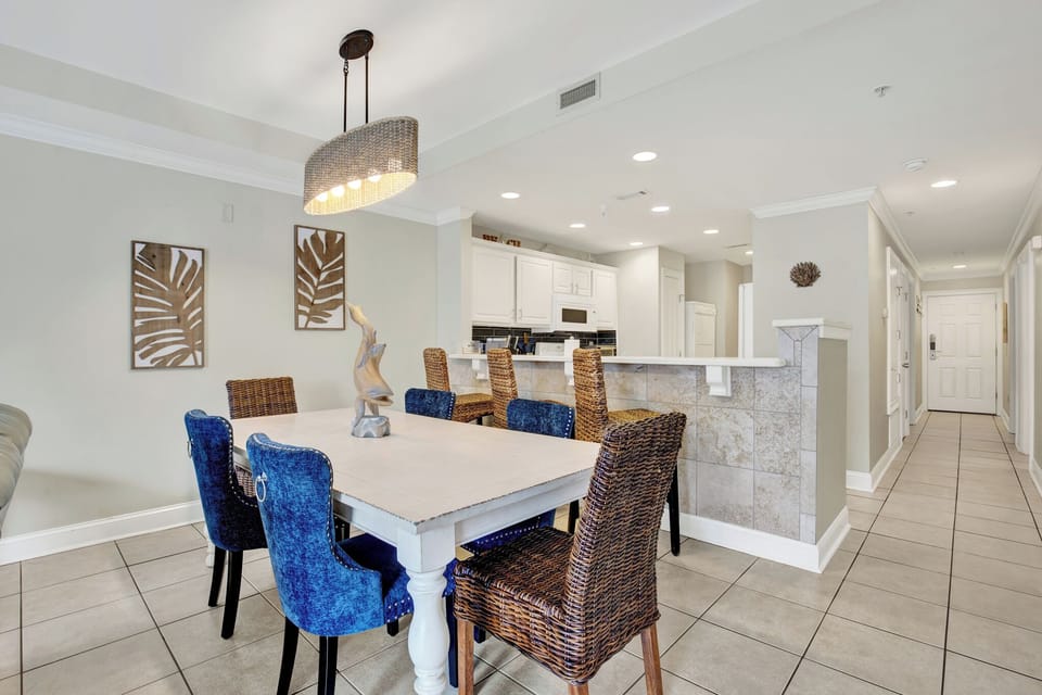 Large dining table with seating for six.