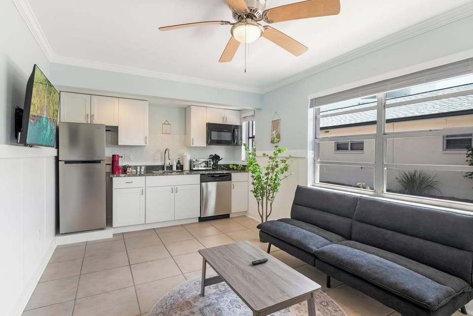 Cook, dine & unwind—sunny open layout links kitchen to living space.