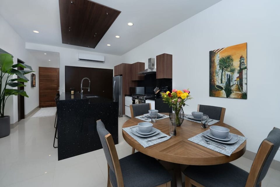 Stylish dining area for memorable meals with a view.