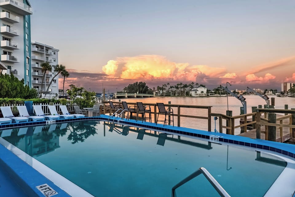 Evening swims with skies that glow—your poolside paradise.
