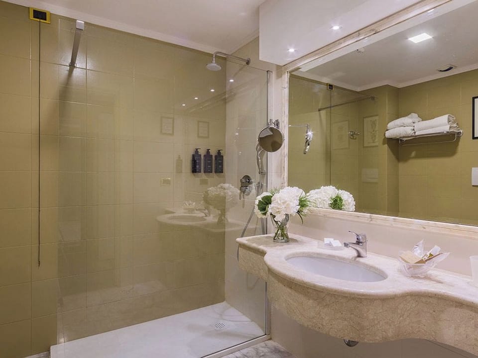 Triple Room | Bathroom | Designer toiletries, hair dryer, slippers, bidet