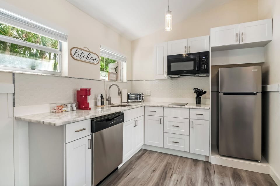 Arrive to a sleek, modern kitchen ready for your stay.