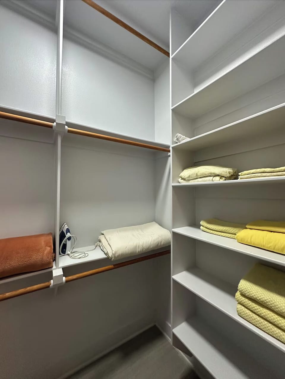 extra linens and towels provided in both closets, as well as an iron/ironing boa