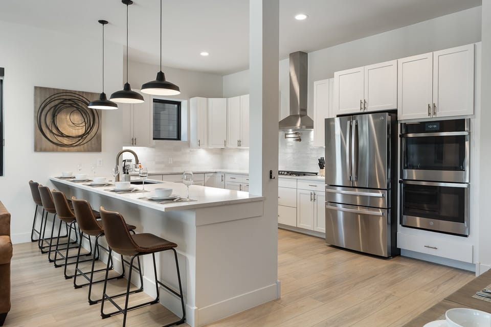 Huge Fully Stocked Chefs Kitchen With Bar Seating