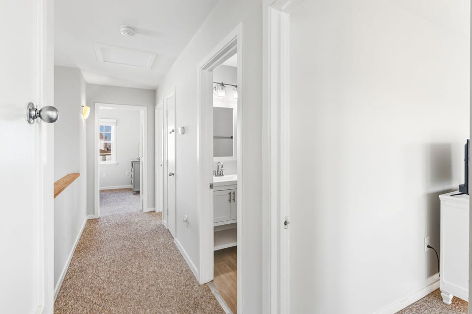 Bright and welcoming townhome just steps from the beach in Cottages at the Cape.