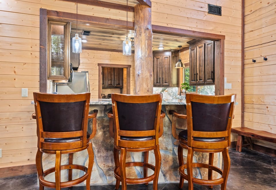 Kitchen bar seating for casual dining and conversation.