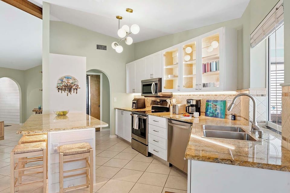 Kitchen with Island Bar and Seating