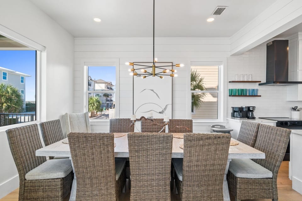 Coastal dining area with abundant natural light