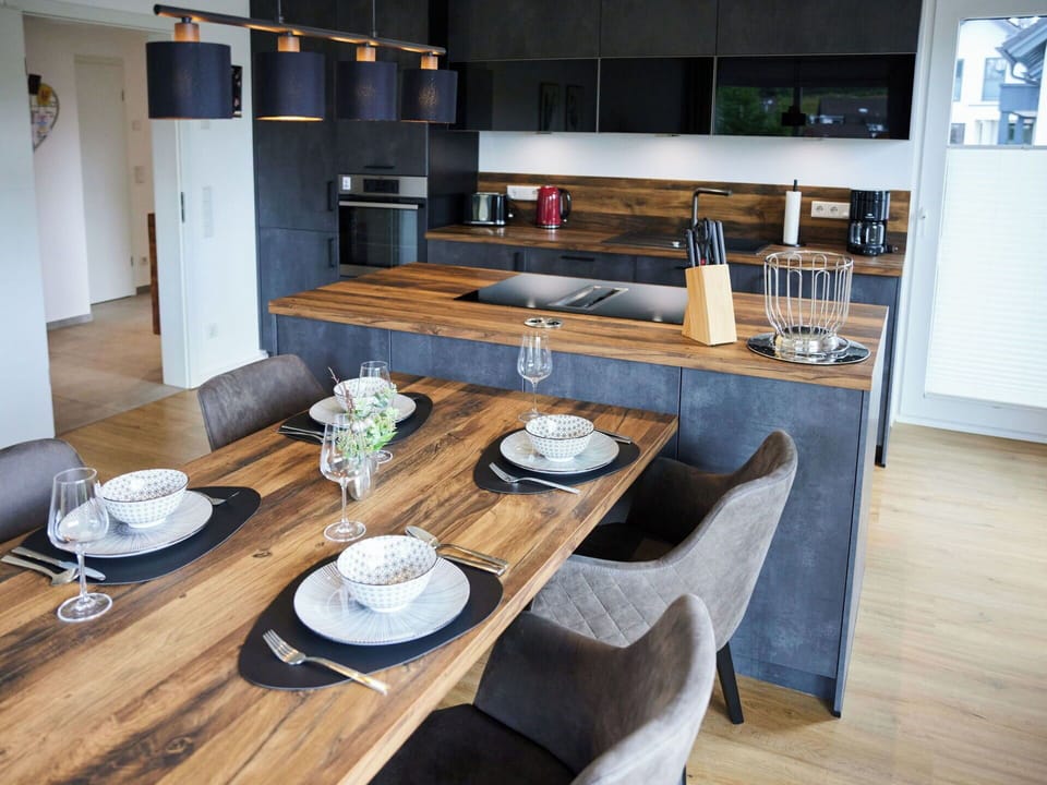 Furniture, Interior Design, Flooring, Countertop, Wood, Kitchen, Cabinetry, Floor, Chair, Ceiling