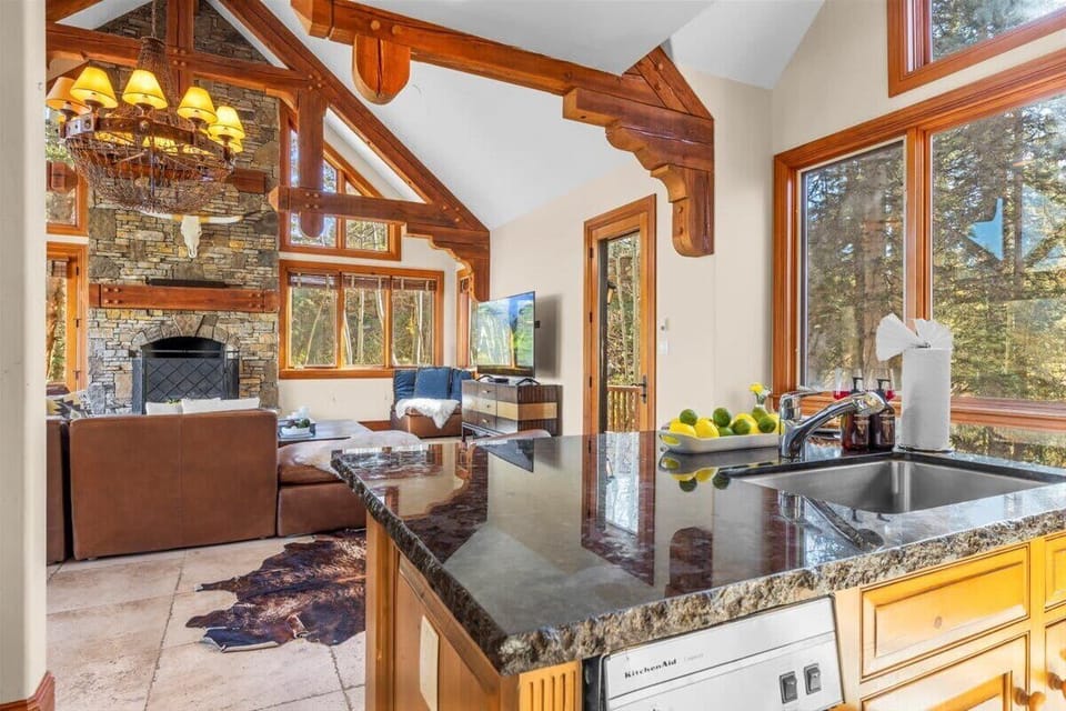 Kitchen: Third floor, drip coffee maker, toaster, filtered water, cooking utensils, tableware