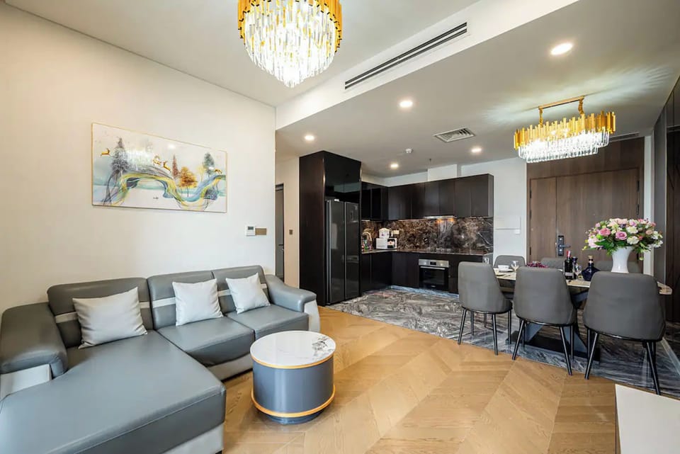 Family Suite, 3 Bedrooms, Club Lounge Access, City View | Living area | 65-inch Smart TV with cable channels, Netflix, smart speakers