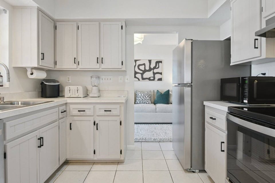 Modern appliances and ample counter space make cooking effortless