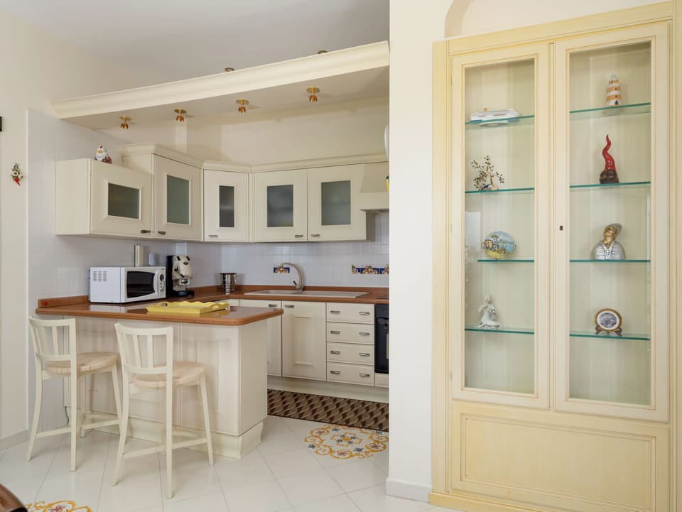 Panoramic Condo, Balcony, Sea View | Private kitchen | Fridge, microwave, oven, stovetop