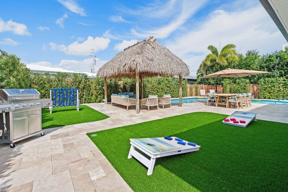 Private resort-style pool surrounded by lush tropical landscaping, offering the perfect setting for relaxing, entertaining, and enjoying sunny South F