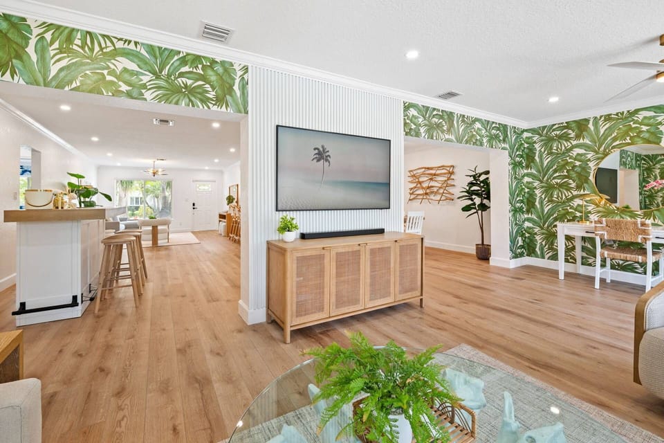 Open-concept design connects the living, dining, and kitchen areas to create an ideal space for entertaining.