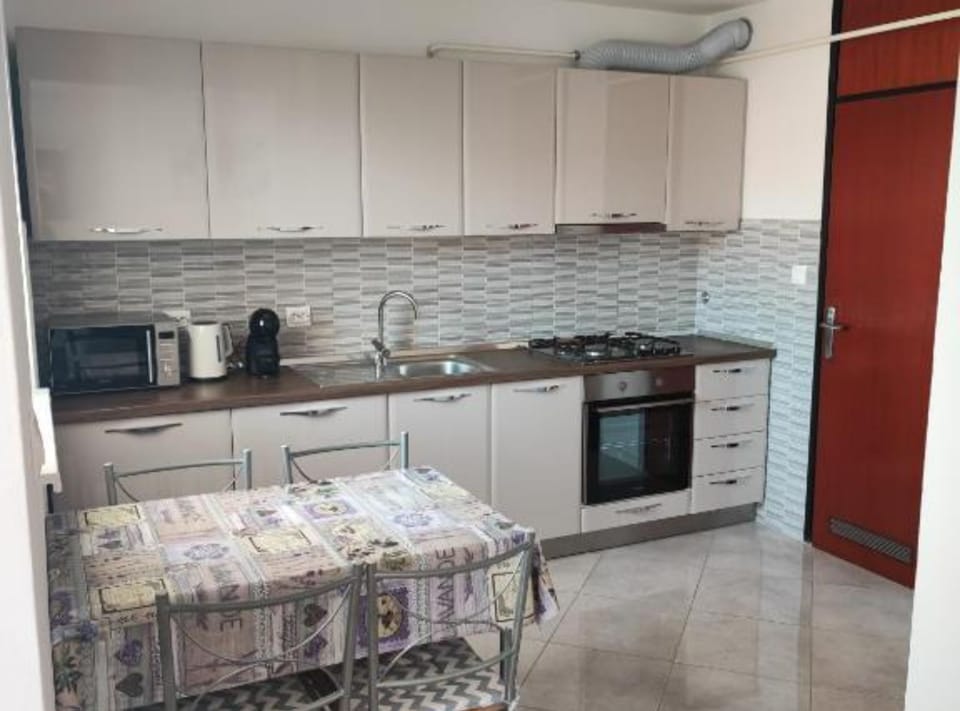 Apartment (One Bedroom Apartment with Balcony) | Private kitchen | Fridge