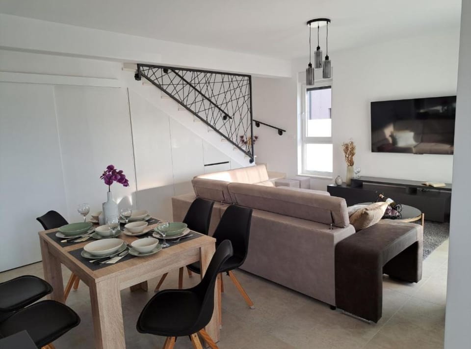 Villa (Villa With Pool) | Living room | 32-inch flat-screen TV with digital channels