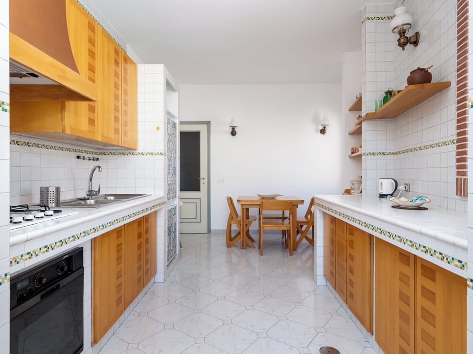 Comfort Apartment, Balcony, Partial Sea View | Private kitchen | Fridge, oven, stovetop, espresso maker
