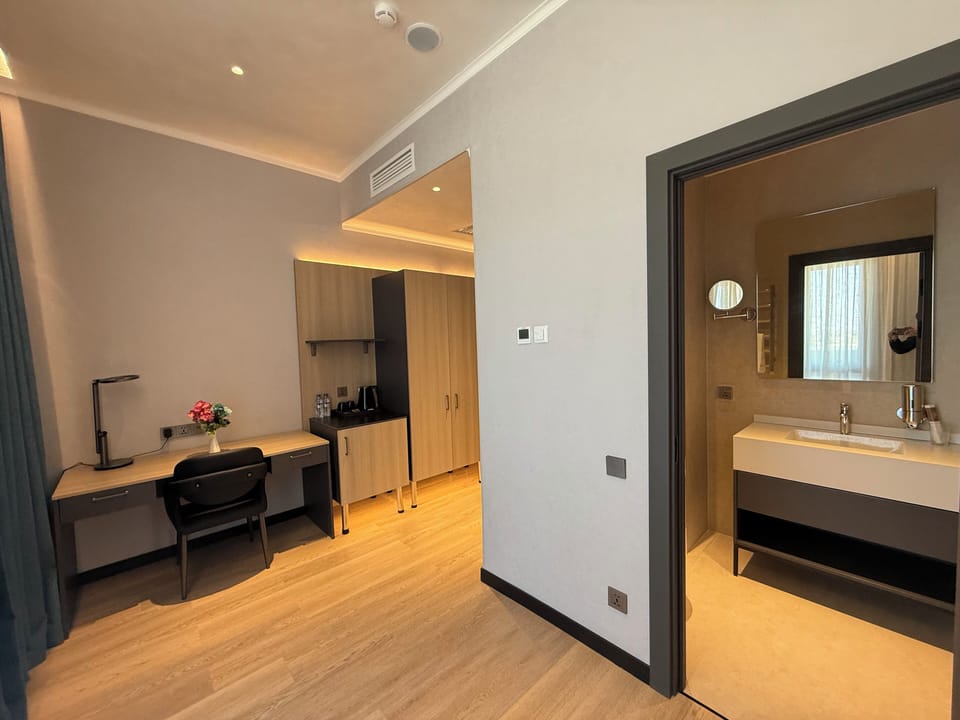 Luxury Suite, City View | In-room safe, blackout drapes, soundproofing, iron/ironing board